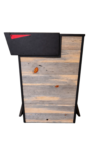Wooden mailbox post with black top and red flag on a white background