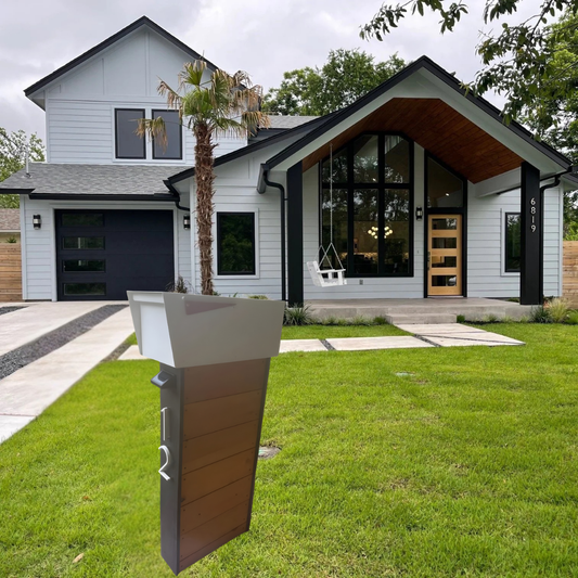 Modern house with a mailbox post in the foreground