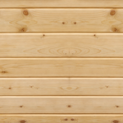 Close-up of a wooden surface with visible grain and natural pine texture